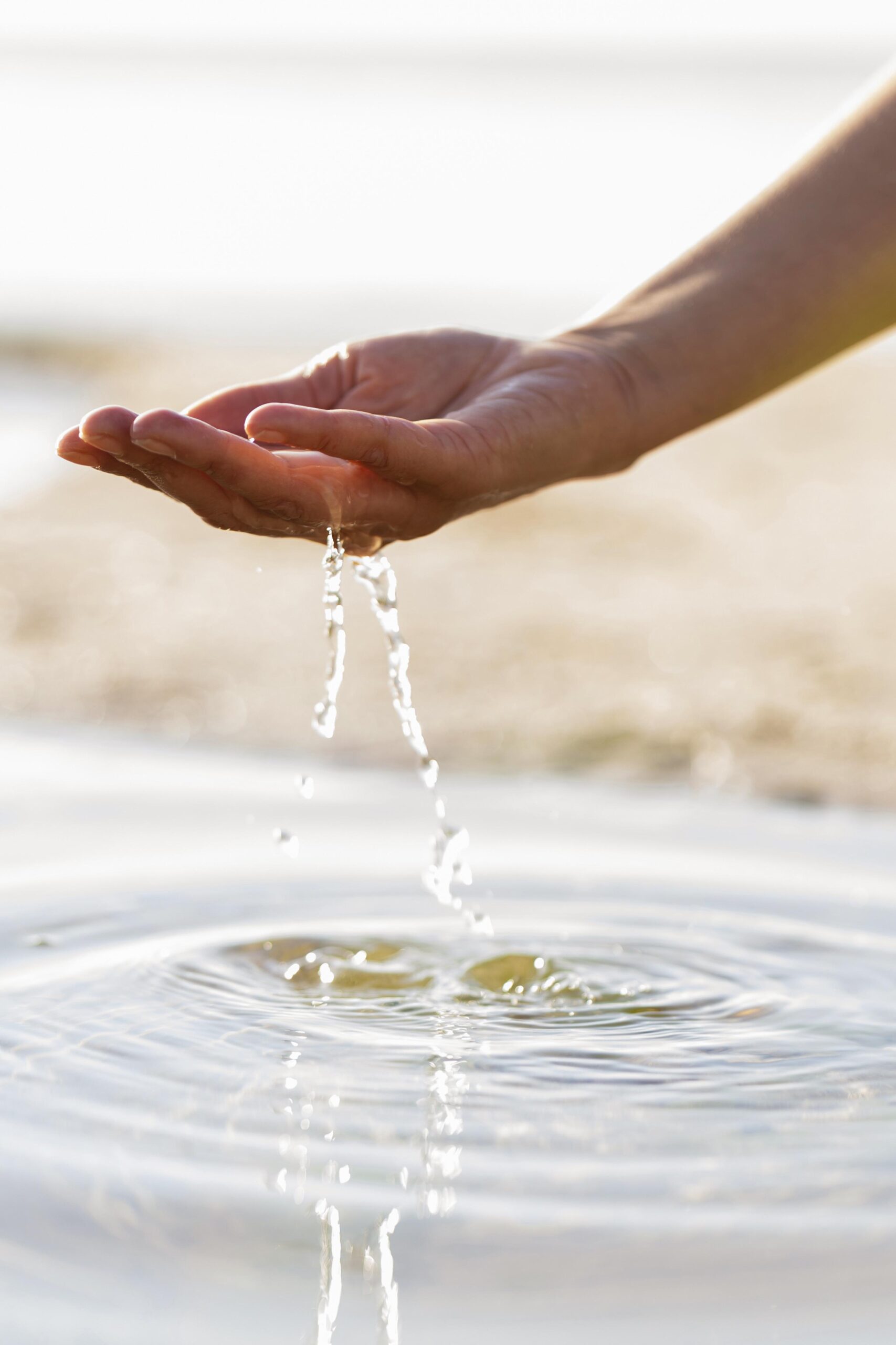 Over Control Flow / Cenergist 2 woman holding clear water her hand scaled